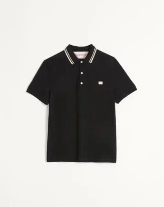 Bawełniana koszulka polo z pikowanym materiałem i naszywką z logo Bawełniana koszulka polo z pikowanym materiałem i naszywką z logo