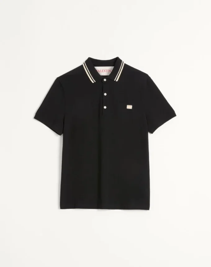 Bawełniana koszulka polo z pikowanym materiałem i naszywką z logo Bawełniana koszulka polo z pikowanym materiałem i naszywką z logo