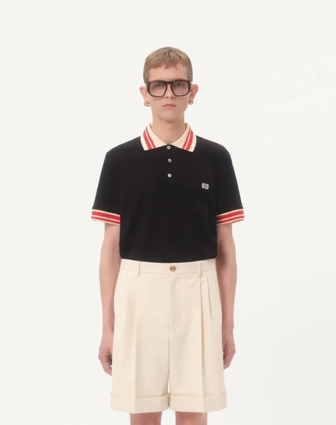 Bawełniana koszulka polo z pikowanym materiałem i naszywką z logo Bawełniana koszulka polo z pikowanym materiałem i naszywką z logo