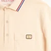 Bawełniana koszulka polo z pikowanym materiałem i naszywką z logo Bawełniana koszulka polo z pikowanym materiałem i naszywką z logo