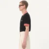 Bawełniana koszulka polo z pikowanym materiałem i naszywką z logo Bawełniana koszulka polo z pikowanym materiałem i naszywką z logo