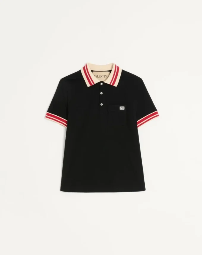 Bawełniana koszulka polo z pikowanym materiałem i naszywką z logo Bawełniana koszulka polo z pikowanym materiałem i naszywką z logo