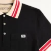 Bawełniana koszulka polo z pikowanym materiałem i naszywką z logo Bawełniana koszulka polo z pikowanym materiałem i naszywką z logo