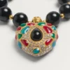 Bransoletka Coeur Royal z metalu, żywicy, emalii i kryształów Swarovski® Bransoletka Coeur Royal z metalu, żywicy, emalii i kryształów Swarovski®