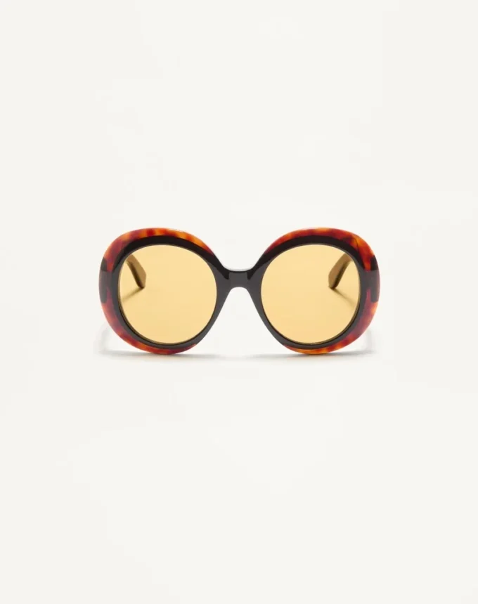 Efektowne okrągłe okulary z acetatu w stylu lat 60. Efektowne okrągłe okulary z acetatu w stylu lat 60.