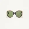 Efektowne okrągłe okulary z acetatu w stylu lat 60. Efektowne okrągłe okulary z acetatu w stylu lat 60.