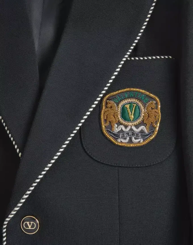 Jednorzędowa wełniana marynarka Valentino z naszywką Valentino
