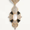 Kolczyki Pas Plus z metalu, żywicy, emalii i kryształów Swarovski® Kolczyki Pas Plus z metalu, żywicy, emalii i kryształów Swarovski®