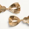 Kolczyki Pas Plus z metalu, żywicy, emalii i kryształów Swarovski® Kolczyki Pas Plus z metalu, żywicy, emalii i kryształów Swarovski®