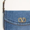 Mała denimowa torba na ramię Valentino Garavani DeVain Mała denimowa torba na ramię Valentino Garavani DeVain
