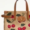 Mała torba na zakupy Valentino Garavani Antibes z raffii żakardowej z wzorem Cherryfic