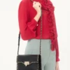 Mała torebka crossbody Rockstud z ziarnistej skóry cielęcej Mała torebka crossbody Rockstud z ziarnistej skóry cielęcej