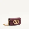 Mała torebka na ramię Valentino Garavani Locò z cielęcej skóry z logo Jewel Mała torebka na ramię Valentino Garavani Locò z cielęcej skóry z logo Jewel