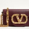 Mała torebka na ramię Valentino Garavani Locò z cielęcej skóry z logo Jewel Mała torebka na ramię Valentino Garavani Locò z cielęcej skóry z logo Jewel