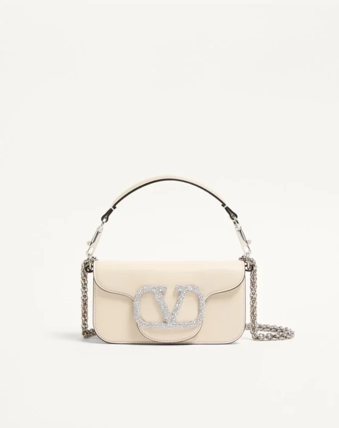 Mała torebka na ramię Valentino Garavani Locò z logo Jewel Mała torebka na ramię Valentino Garavani Locò z logo Jewel