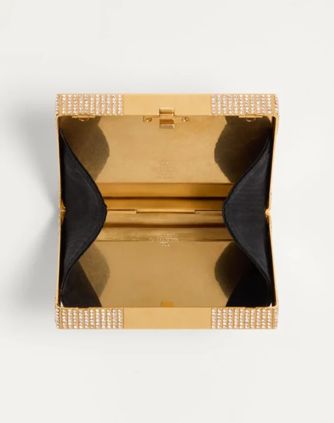 Metalowa kopertówka Minaumorphe Minaudière marki Valentino Garavani z kryształami Swarovski® i satynowym etui Metalowa kopertówka Minaumorphe Minaudière marki Valentino Garavani z kryształami Swarovski® i satynowym etui
