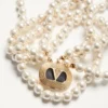 Naszyjnik owalny z metalu, emalii, pereł i kryształów Swarovski® Naszyjnik owalny z metalu, emalii, pereł i kryształów Swarovski®