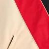 Nylonowa kurtka wiatrówka z kapturem i naszywką z logo Nylonowa kurtka wiatrówka z kapturem i naszywką z logo