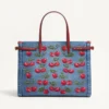 Średnia torba na zakupy Valentino Garavani Antibes z denimu z haftem Cherryfic Średnia torba na zakupy Valentino Garavani Antibes z denimu z haftem Cherryfic