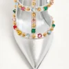 Rockstud Décolleté z laminowanej skóry nappa z kaboszonem i kryształami 100 mm Rockstud Décolleté z laminowanej skóry nappa z kaboszonem i kryształami 100 mm