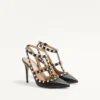 Szpilki Rockstud z chropowatej skóry z paskiem wokół kostki 100 mm Szpilki Rockstud z chropowatej skóry z paskiem wokół kostki 100 mm