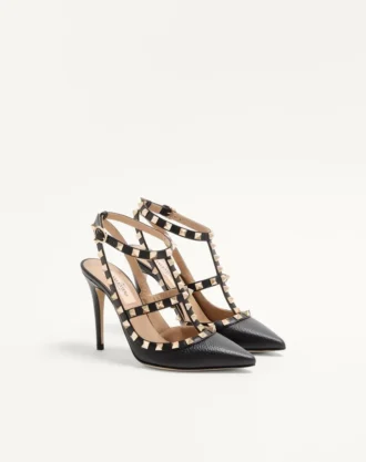 Szpilki Rockstud z chropowatej skóry z paskiem wokół kostki 100 mm Szpilki Rockstud z chropowatej skóry z paskiem wokół kostki 100 mm