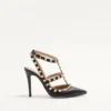Szpilki Rockstud z chropowatej skóry z paskiem wokół kostki 100 mm Szpilki Rockstud z chropowatej skóry z paskiem wokół kostki 100 mm