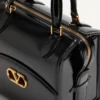 Torba bowlingowa Valentino Garavani Vain-Case z błyszczącej skóry cielęcej