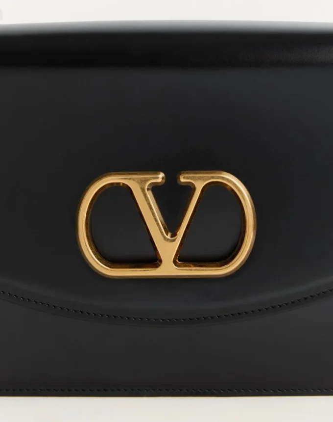 Torba na ramię Valentino Garavani Vain z błyszczącej skóry cielęcej Torba na ramię Valentino Garavani Vain z błyszczącej skóry cielęcej