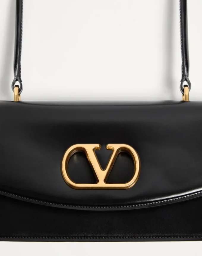 Torba Valentino Garavani Vain z uchwytem z błyszczącej skóry cielęcej Torba Valentino Garavani Vain z uchwytem z błyszczącej skóry cielęcej
